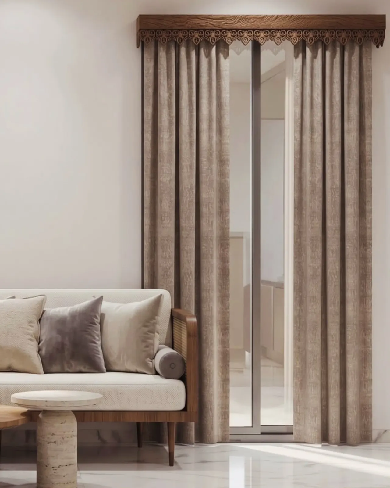 Curtains with carved timber pelmet beside a cane-framed sofa